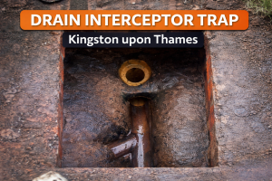 Drain interceptor trap problems in Kingston upon Thames showing an open inspection chamber with a traditional water-sealed interceptor trap identified by Drains24