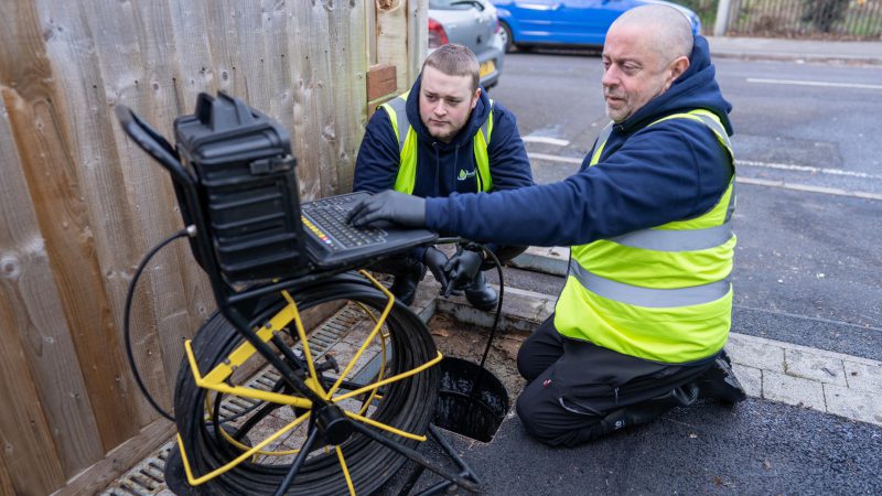 Drain engineer carrying out a professional CCTV drain inspection at a Kingston property